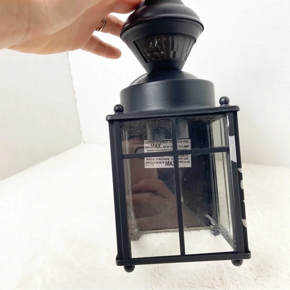 Black outdoor motion light sconce